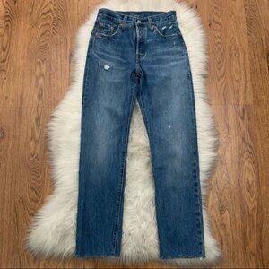 Levi’s. Blue Distressed Jeans Size 23. 100% cotton denim. Raw hem high rise.